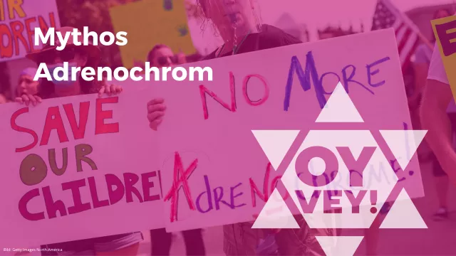 Schild auf einer Demonstration: No More Adrenochrome